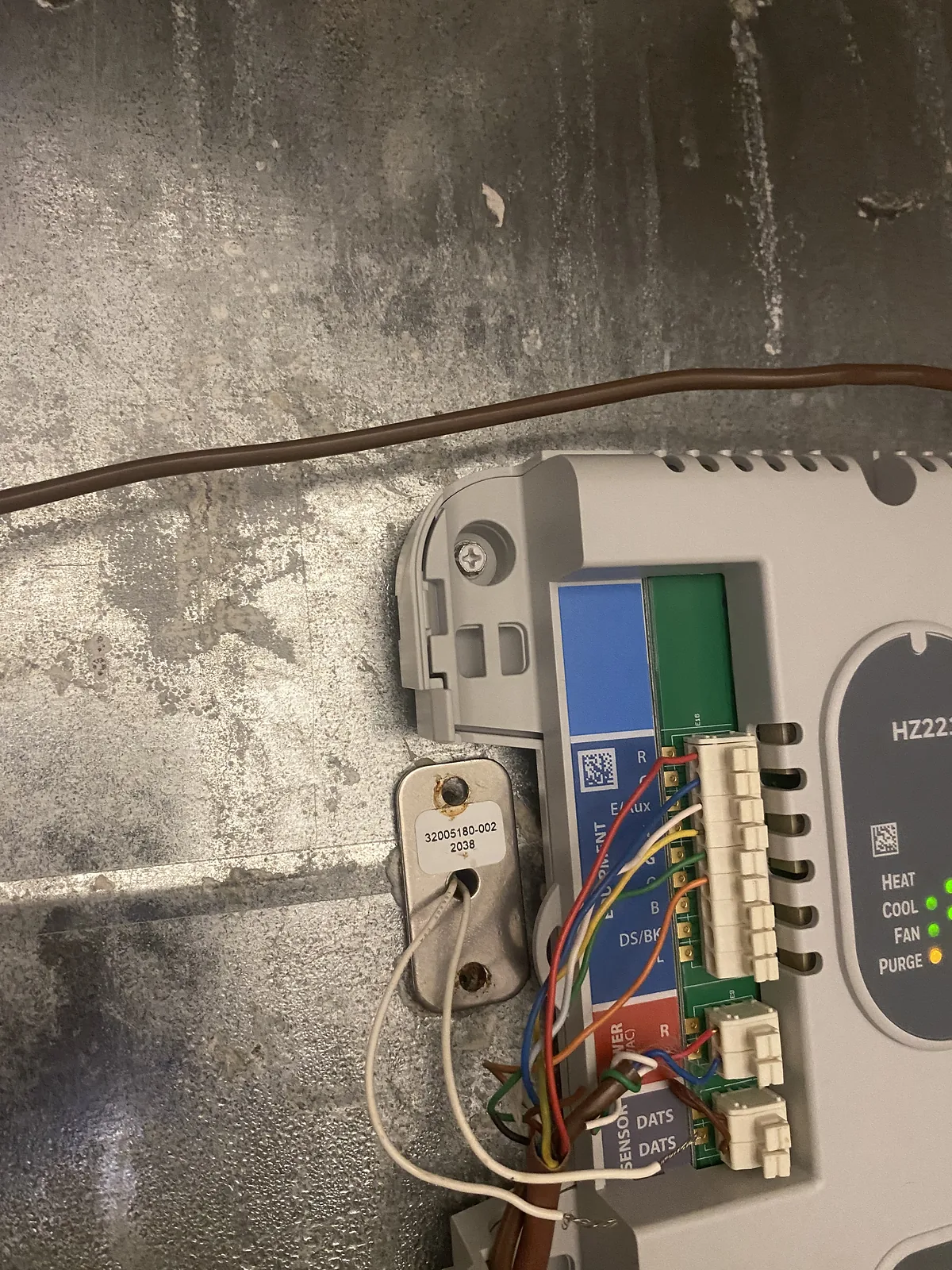 Furnace control board undergoing diagnostic testing during a heating service call in Grapevine.