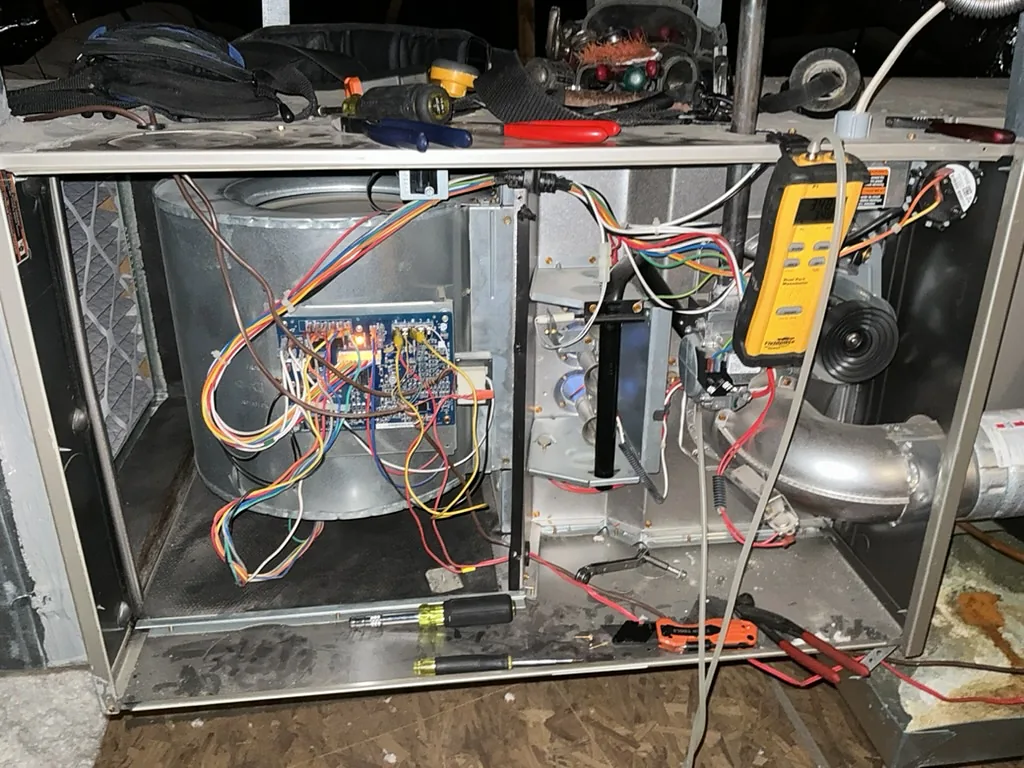 HVAC electrical components being tested with professional diagnostic instruments during an AC repair call in Grapevine.