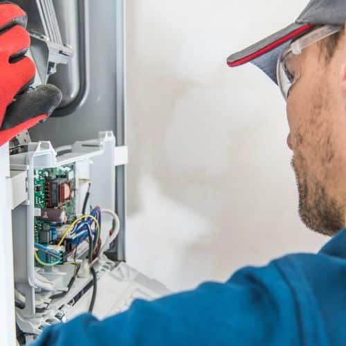 HVAC Technician Checks System