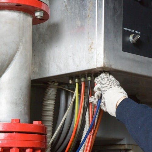 close-up of a furnace being repaired